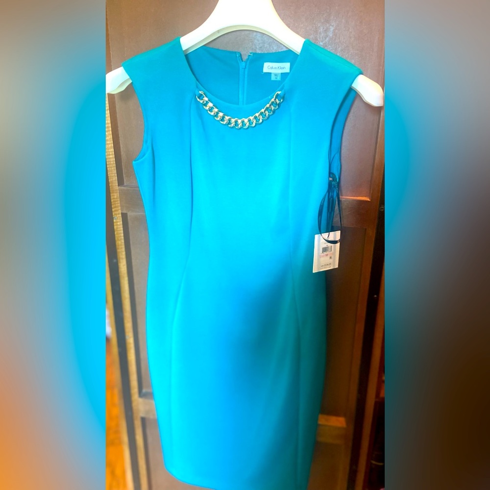 Turquoise Calvin Klein Dress with gold accent
